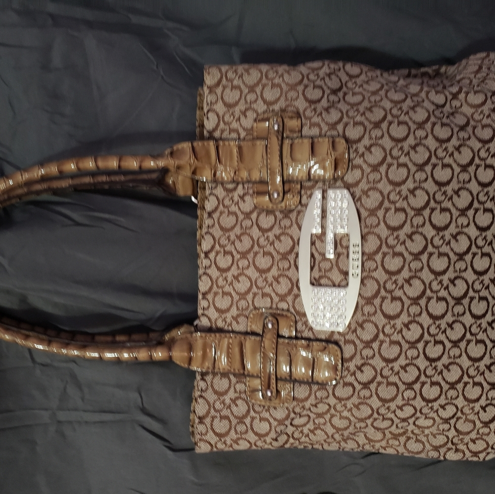 Guess tan bag with tan logo lining